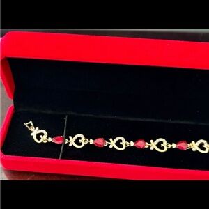 Gold Heart Link Bracelet with Red Teardrop Gemstones